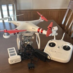 White and Red Drone with Controller